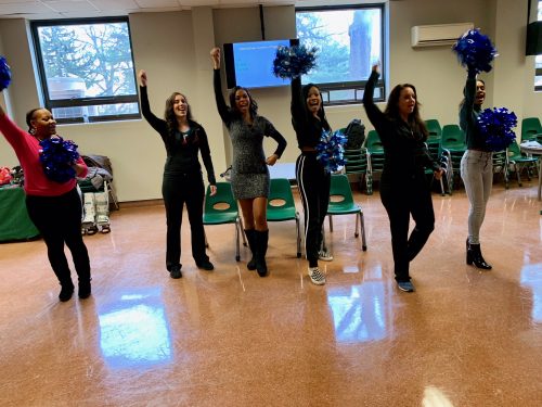 Science Cheerleaders rally at Archbishop Carroll High School STEM Expo